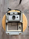 Polaroid Automatic 103 Land Gray Camera With Cold-clip, Case, Manual. Fixed Price $150.00.