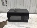 General Electric Household Turntable Microwave Oven. Fixed Price $99.00.