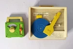 Vintage Fisher Price Player W/ 4 Records & Toyland Radio Music Box 1971. Fixed Price $34.99.