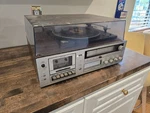 Vintage Montgomery Ward Gen 6317A Multi Cassette Tape 8-TRACK Turntable Stereo. Fixed Price $25.00.