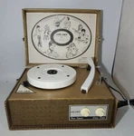 Vintage Dejay Model 225 Four Speed Solid State Portable Suitcase Record Player. Fixed Price $109.99.