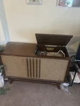 Packard Bell Vintage Console Record Player Wood Cabinet. Fixed Price $500.00.