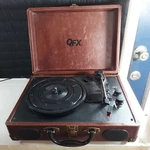 Qfx TURN-105 Rechargeable Retro Suitcase Turntable Bluetooth/aux/speaker. Fixed Price $30.00.