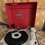 General Electric Solid State Automatic Record Player Turntable, Red. Fixed Price $100.00.