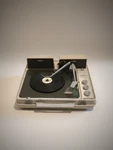 Singer Portable Turntable Player Cream - With Speakers & 20 Records. Fixed Price $365.00.