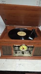 Vintage 7-IN-1 Bluetooth Record Player With Built-in Speakers & Mahogany Finish. Fixed Price $79.99.