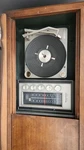 Magnavox Astro Sonic Vintage Wooden Record Player Console W/ Woven Speaker Front. Fixed Price $500.00.
