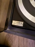 Fisher Automatic Turntable 33/45 Rpm Black Record Player W/ Dust Cover + Vinyls. Fixed Price $650.00.