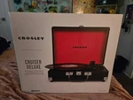 Crosley Portable Turntable Featuring Built- Bluetooth Speakers (in Box). Fixed Price $50.00.
