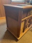 Magnavox Astro Sonic Vintage Wooden Record Player Console W/ Woven Speaker Front. Fixed Price $200.00.